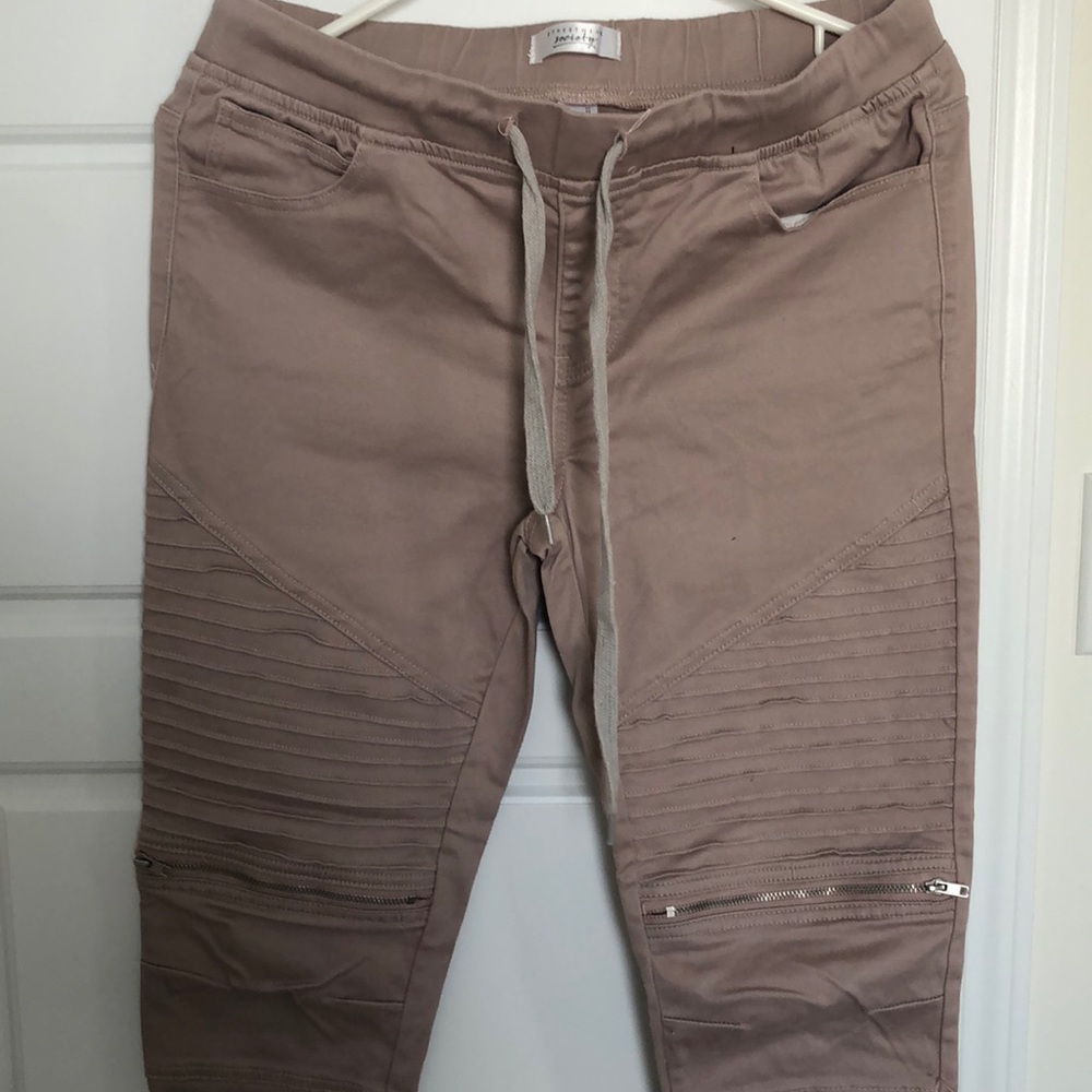 Light pink joggers.